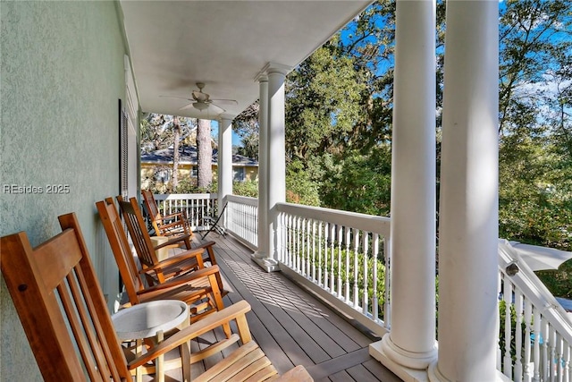 wooden deck with ceiling fan