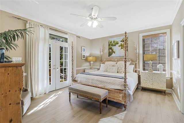 bedroom with french doors, access to exterior, ceiling fan, and light hardwood / wood-style floors