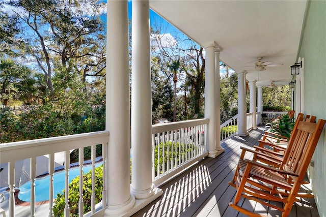 wooden deck with ceiling fan