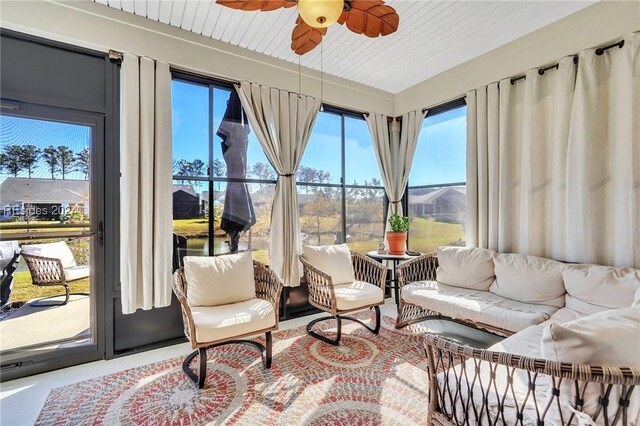 sunroom / solarium with ceiling fan