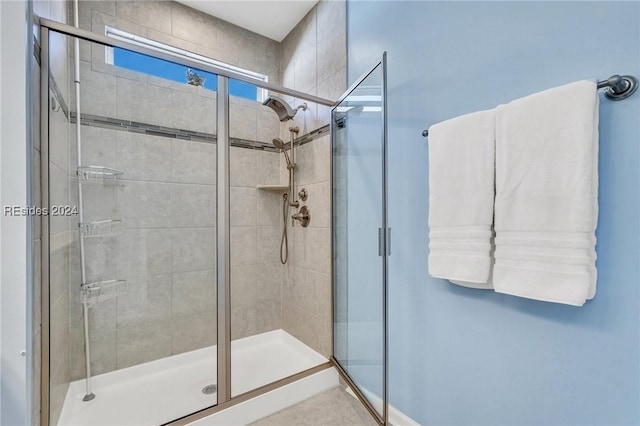 bathroom featuring an enclosed shower