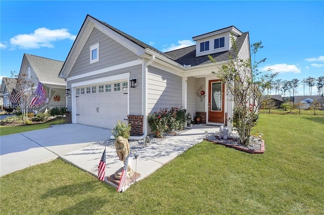 view of front facade with a garage and a front yard