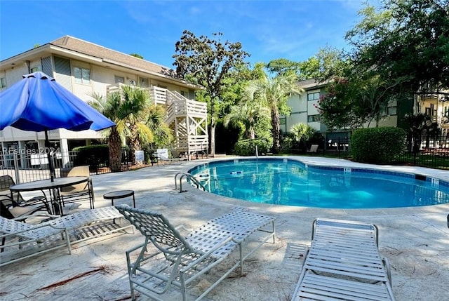 view of pool featuring a patio