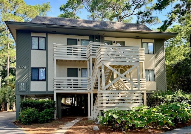 exterior space featuring a balcony