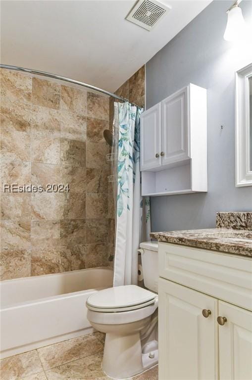 full bathroom featuring vanity, toilet, and shower / tub combo with curtain