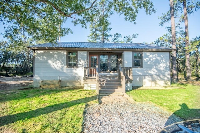 ranch-style house with a front lawn