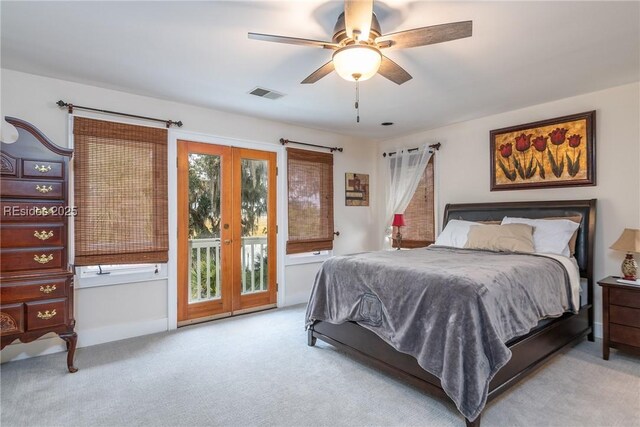 carpeted bedroom with access to exterior and ceiling fan