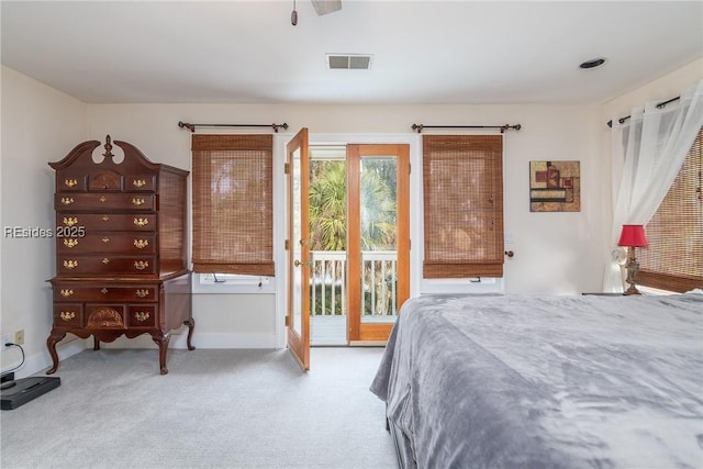 bedroom with carpet flooring and access to exterior