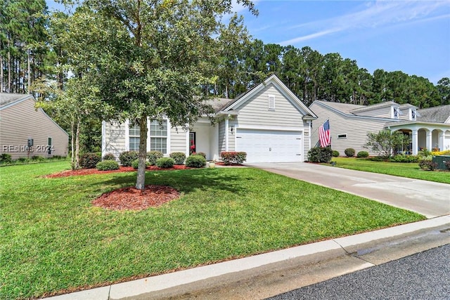 view of front of property with a garage and a front yard