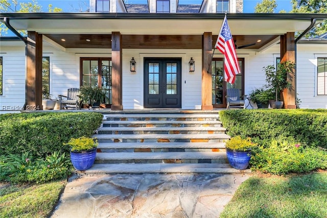 doorway to property featuring a porch