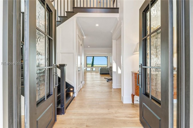 foyer featuring light hardwood / wood-style flooring