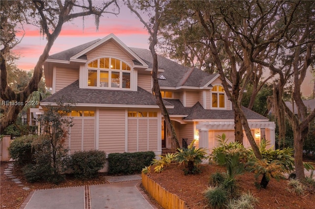 view of front of property with a garage