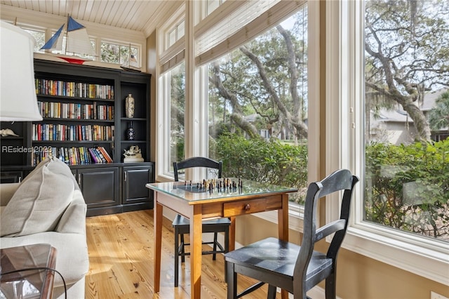 sitting room with wooden ceiling and light hardwood / wood-style floors