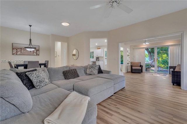 living room with light hardwood / wood-style floors