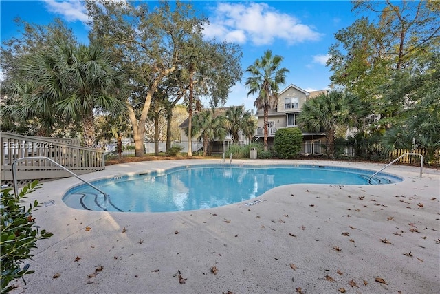 view of pool featuring a patio