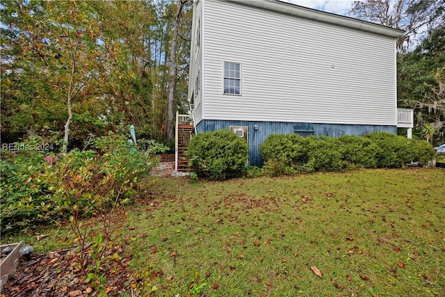 view of home's exterior featuring a yard