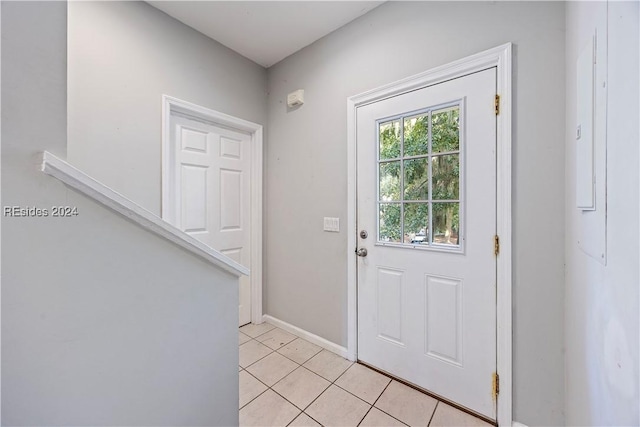 entryway featuring light tile patterned floors