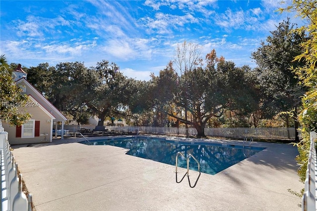 view of pool featuring a patio area