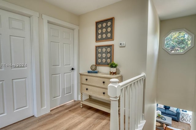 hallway featuring light hardwood / wood-style floors