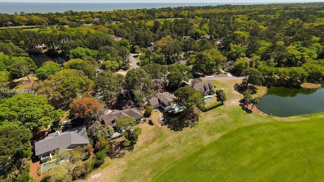 birds eye view of property with a water view