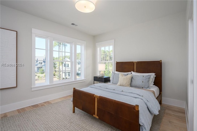 bedroom featuring light wood-type flooring