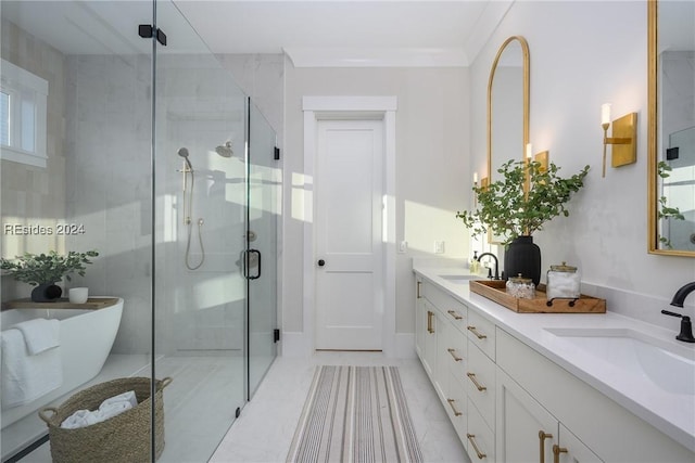 bathroom featuring tile patterned flooring, vanity, and walk in shower