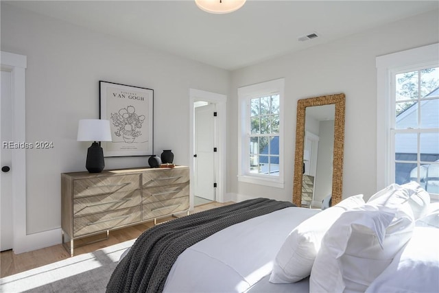 bedroom featuring hardwood / wood-style flooring