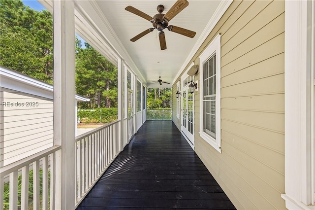 exterior space featuring a porch and ceiling fan