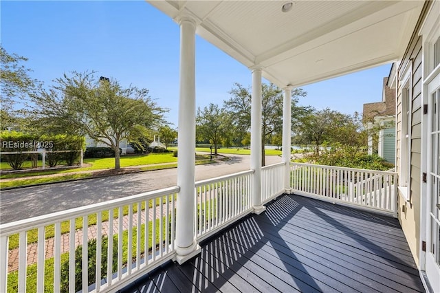 wooden terrace with covered porch