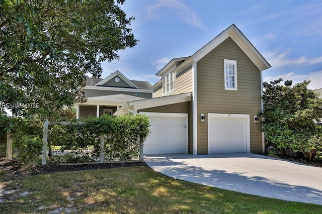 view of front of home with a garage