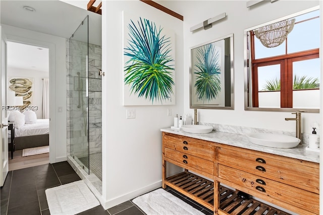 bathroom featuring tile patterned flooring, vanity, tiled shower, and french doors