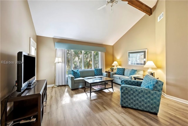 living room with beam ceiling, ceiling fan, high vaulted ceiling, and light wood-type flooring