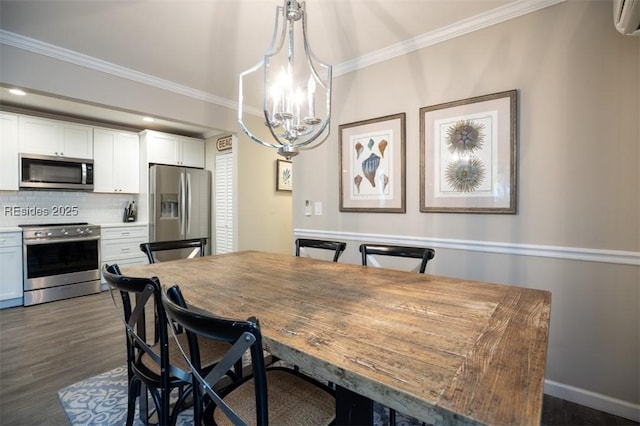 dining space with crown molding, dark hardwood / wood-style flooring, and an inviting chandelier