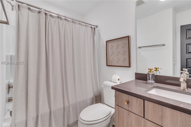 full bathroom with vanity, shower / bathtub combination with curtain, and toilet