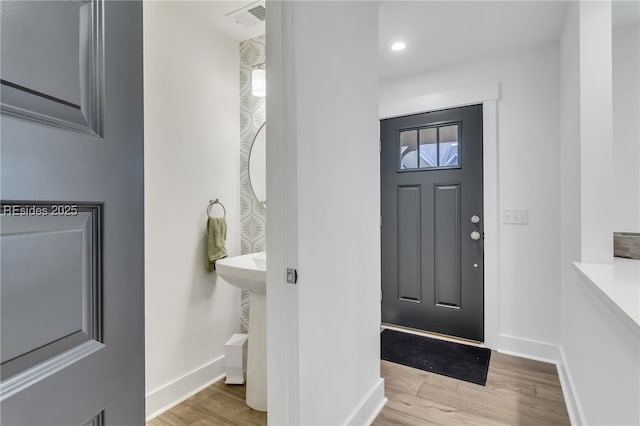 foyer entrance featuring light wood-type flooring