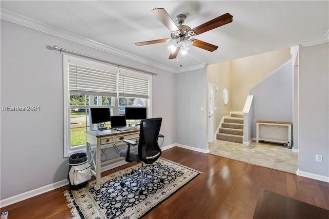 office space with crown molding, hardwood / wood-style floors, and ceiling fan