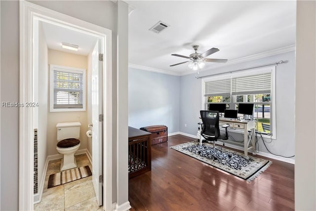 office with hardwood / wood-style flooring, ceiling fan, and ornamental molding