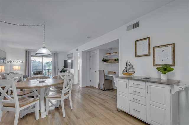 dining area featuring light hardwood / wood-style floors