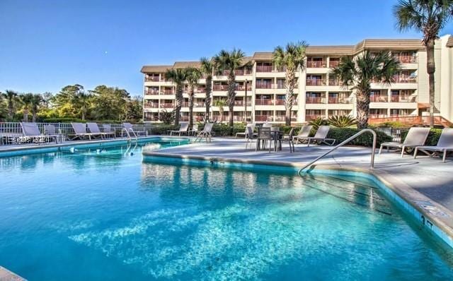 view of swimming pool featuring a patio