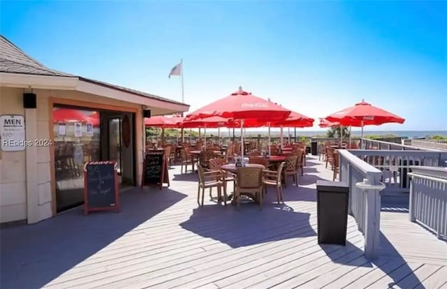 deck featuring a water view