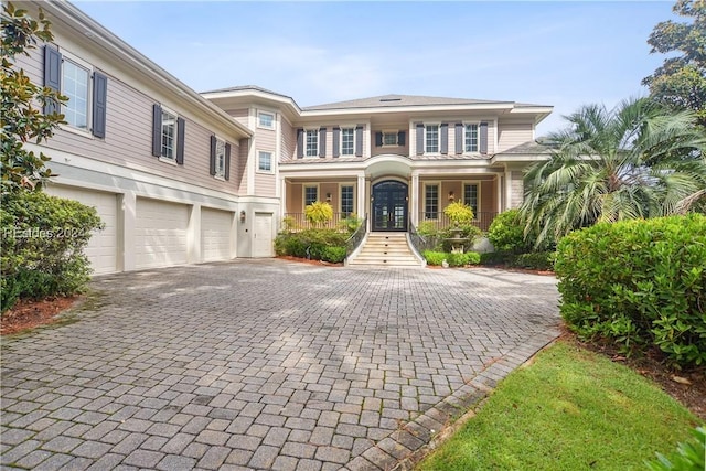 view of front of property with a garage