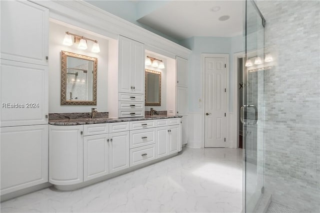 bathroom with vanity and walk in shower