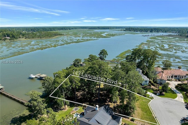 drone / aerial view featuring a water view