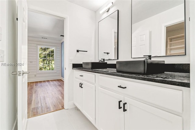 bathroom featuring vanity and tile patterned flooring