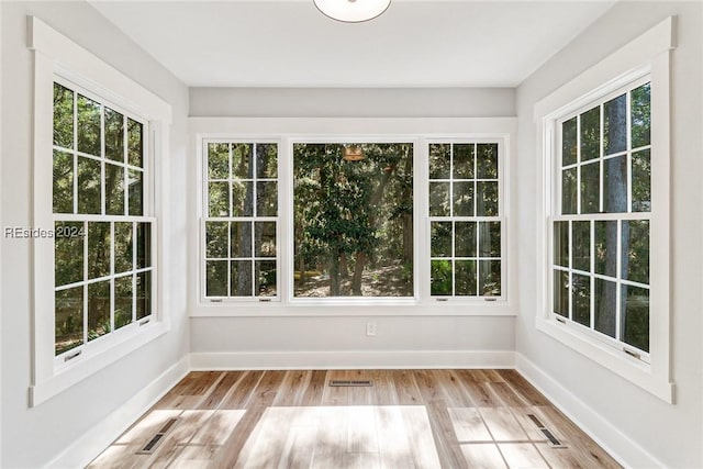 view of unfurnished sunroom