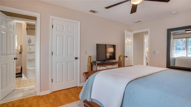 bedroom with ceiling fan and light hardwood / wood-style flooring