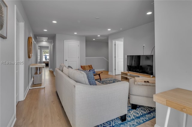 living room with light hardwood / wood-style floors