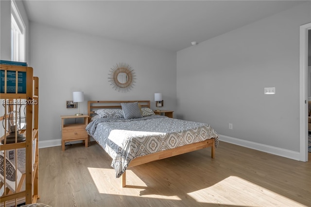 bedroom featuring light hardwood / wood-style floors