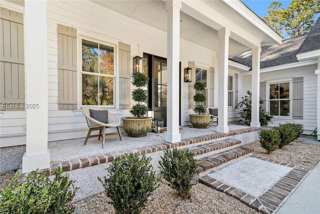 doorway to property with covered porch