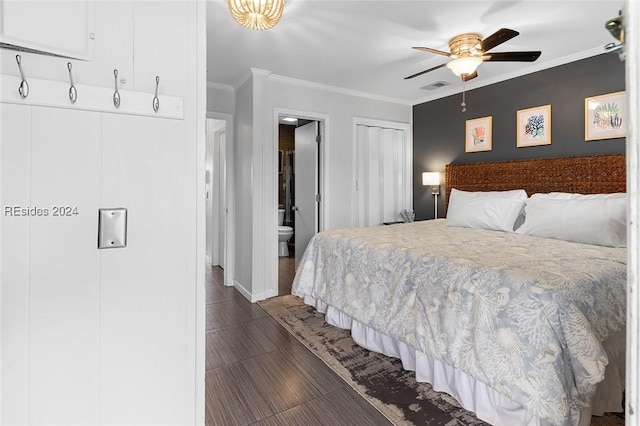 bedroom with ensuite bath, ornamental molding, dark hardwood / wood-style floors, and ceiling fan